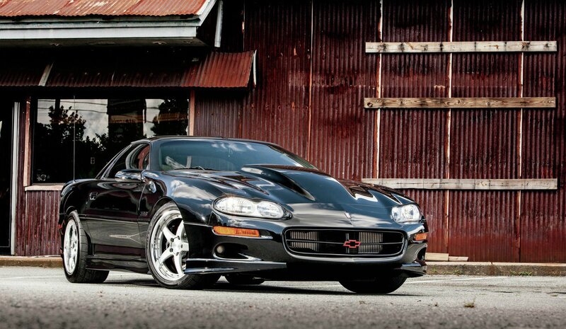 Black Chevrolet Camaro — Dramatic, Afternoon, Photograph, Building