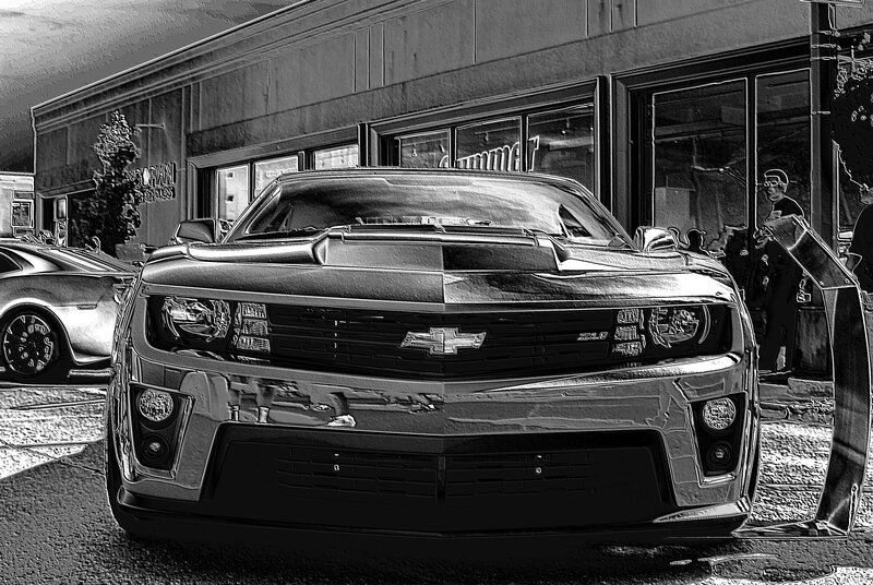 Black Chevrolet Camaro — Dramatic, Photograph, Car, Building, Person