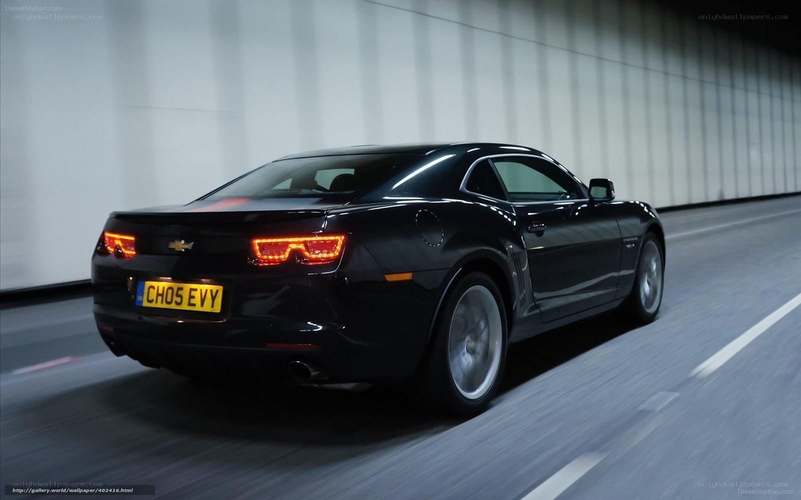 black chevrolet camaro in tunnel