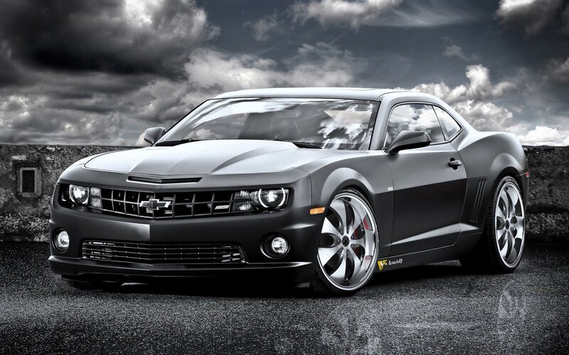 Black Chevrolet Camaro on asphalt