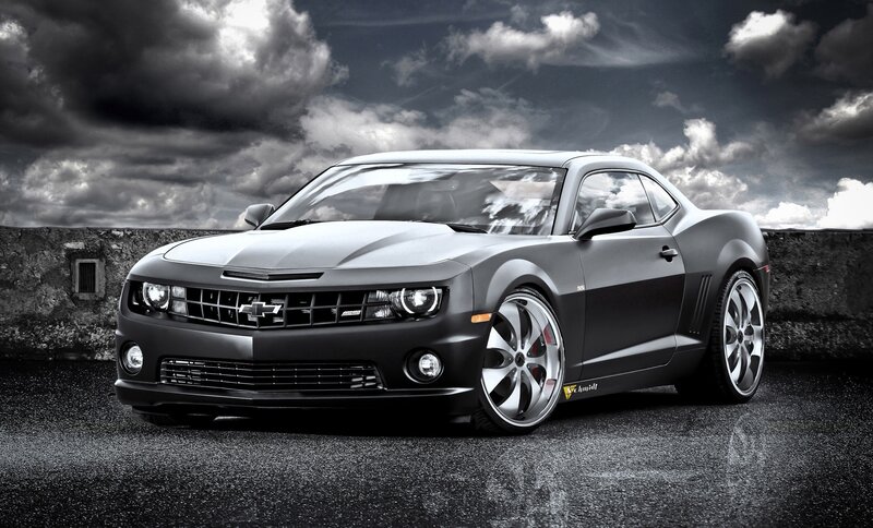 Black Chevrolet Camaro on asphalt