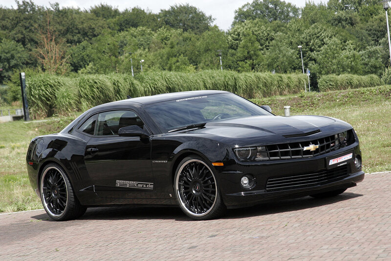 Black Chevrolet Camaro on pavement