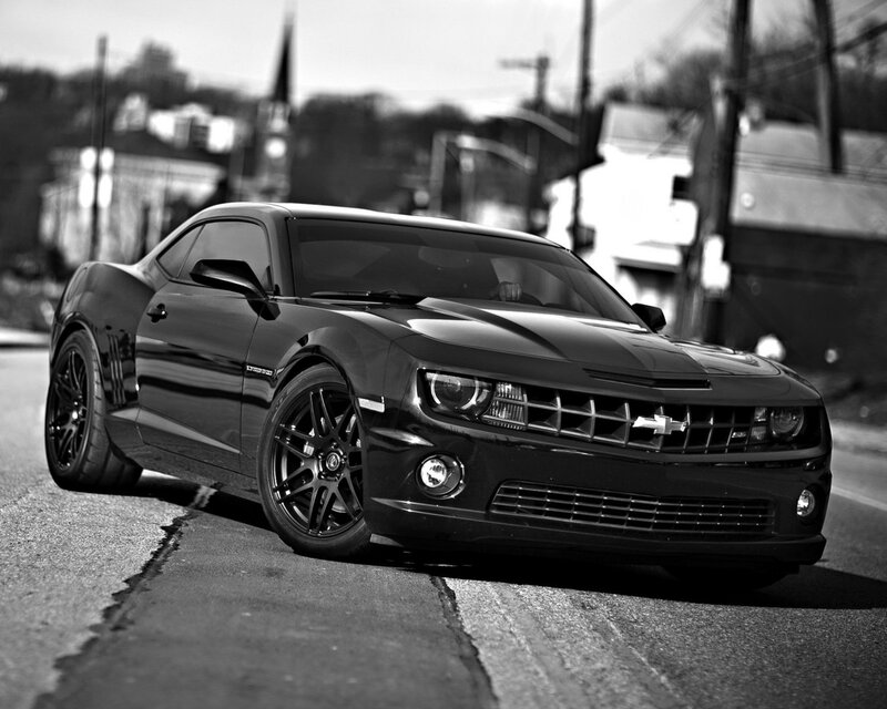 Black Chevrolet Camaro on street