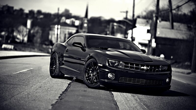 black chevrolet camaro on street
