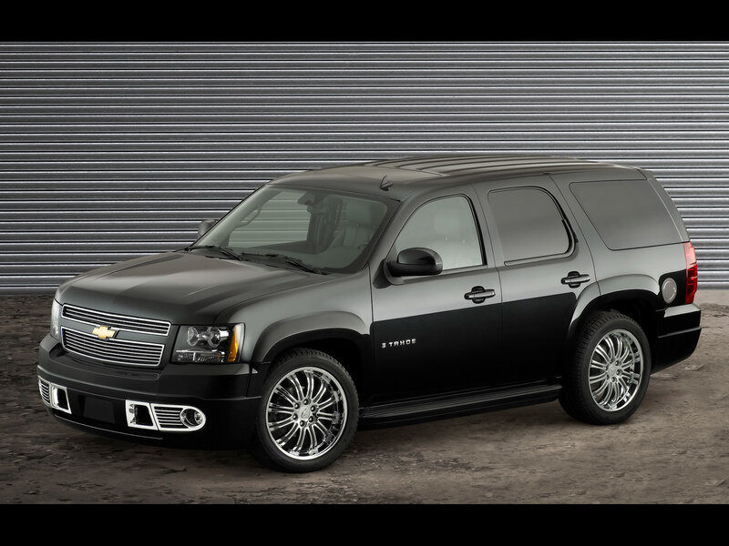 Black Chevrolet Tahoe Suv — Dramatic