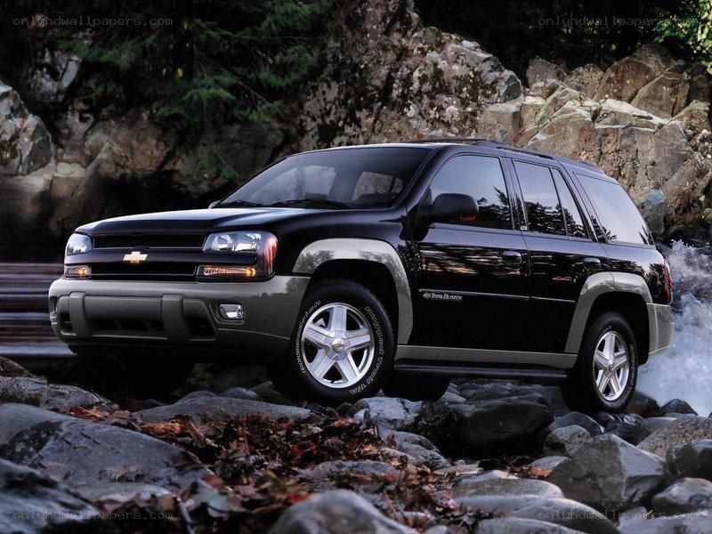 Black Chevrolet TrailBlazer on rocks