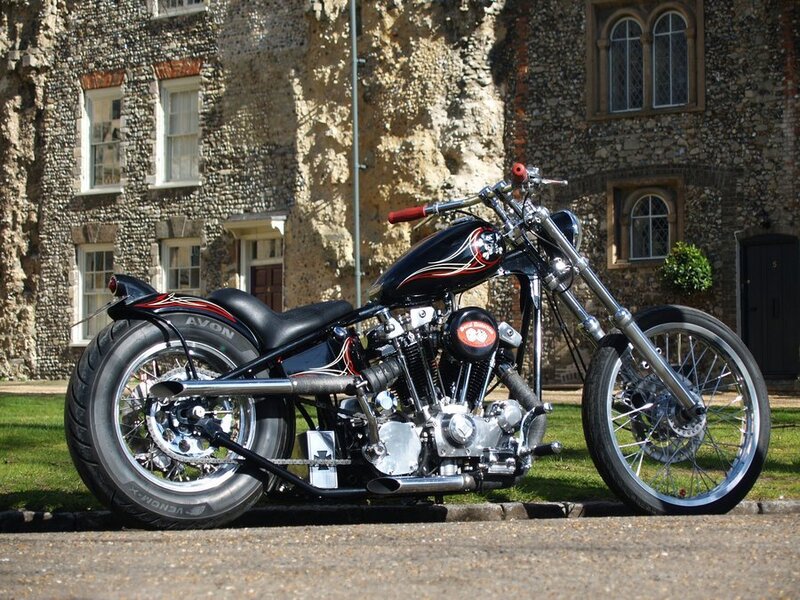 Black Chopper Motorcycle — Calm, Afternoon, Photograph, Stone Building