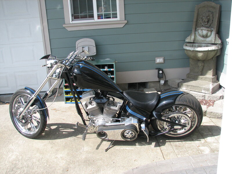 Black Chopper Motorcycle — Calm, Afternoon, Photograph