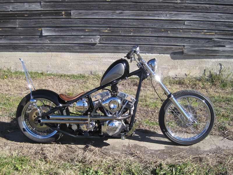 Black Chopper Motorcycle — Calm, Afternoon, Photograph, Wooden Wall