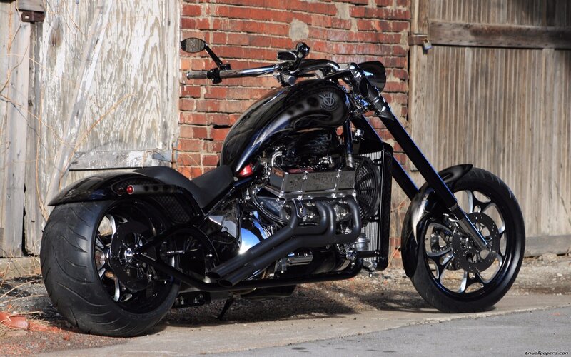 Black Chopper Motorcycle — Dramatic, Afternoon, Photograph, Brick Wall, Wooden Door
