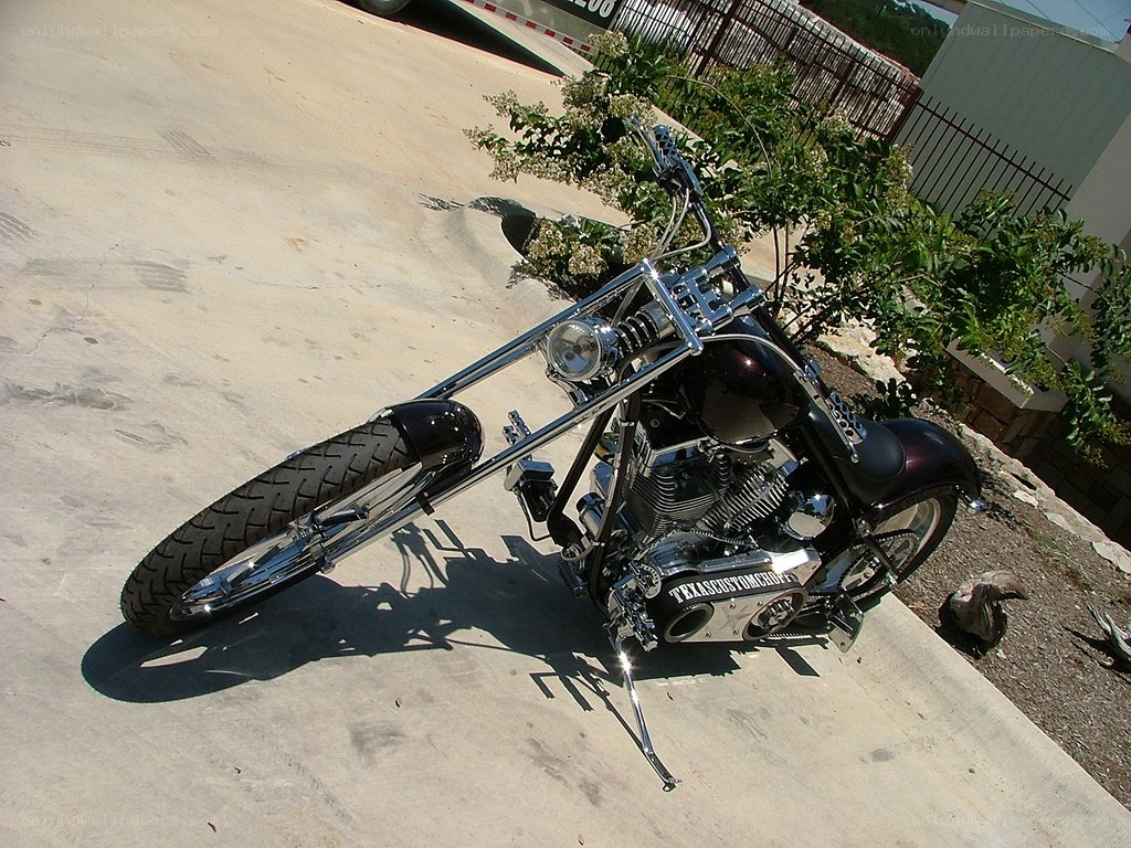 black chopper motorcycle on concrete