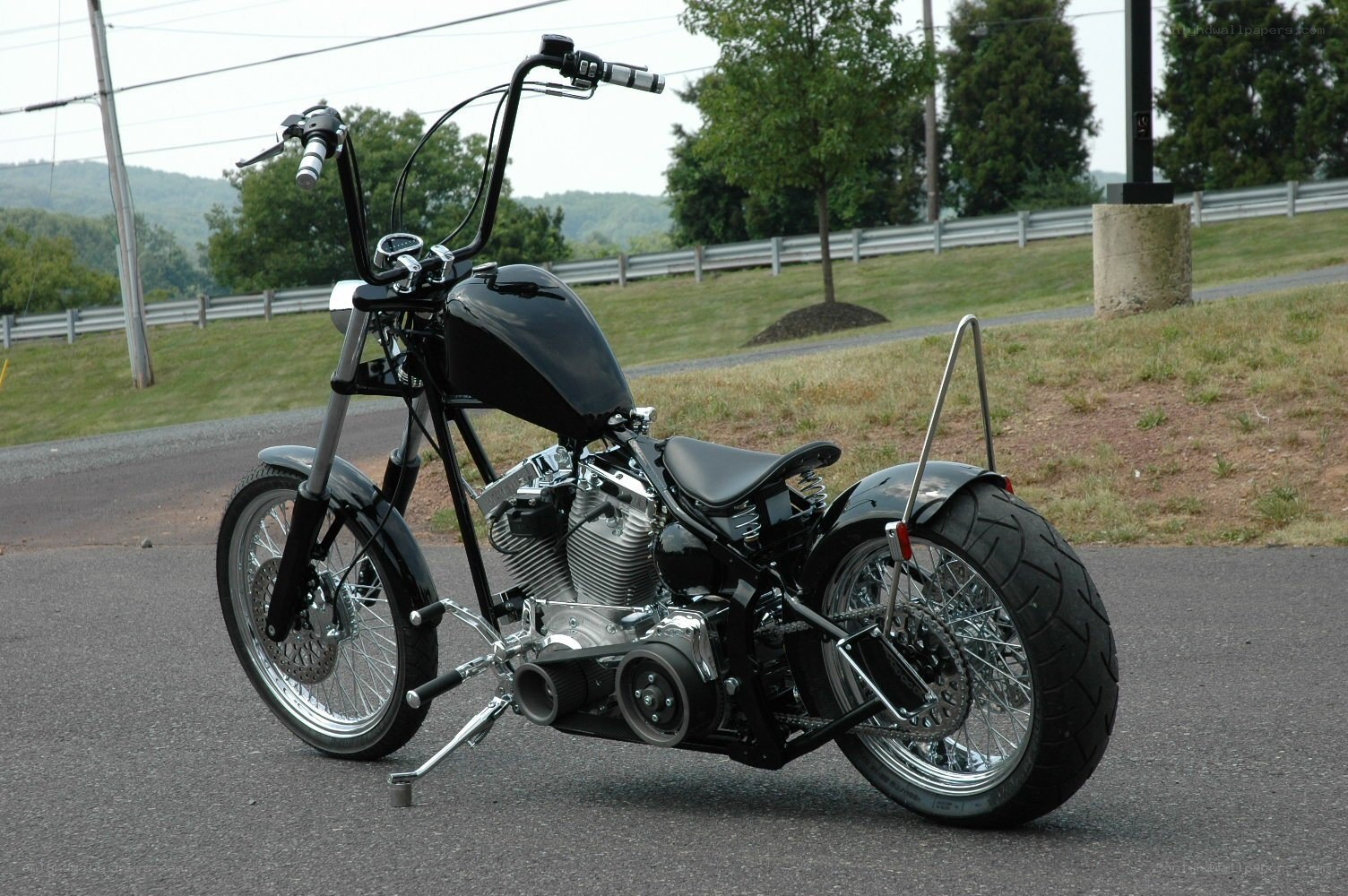 black chopper motorcycle on road