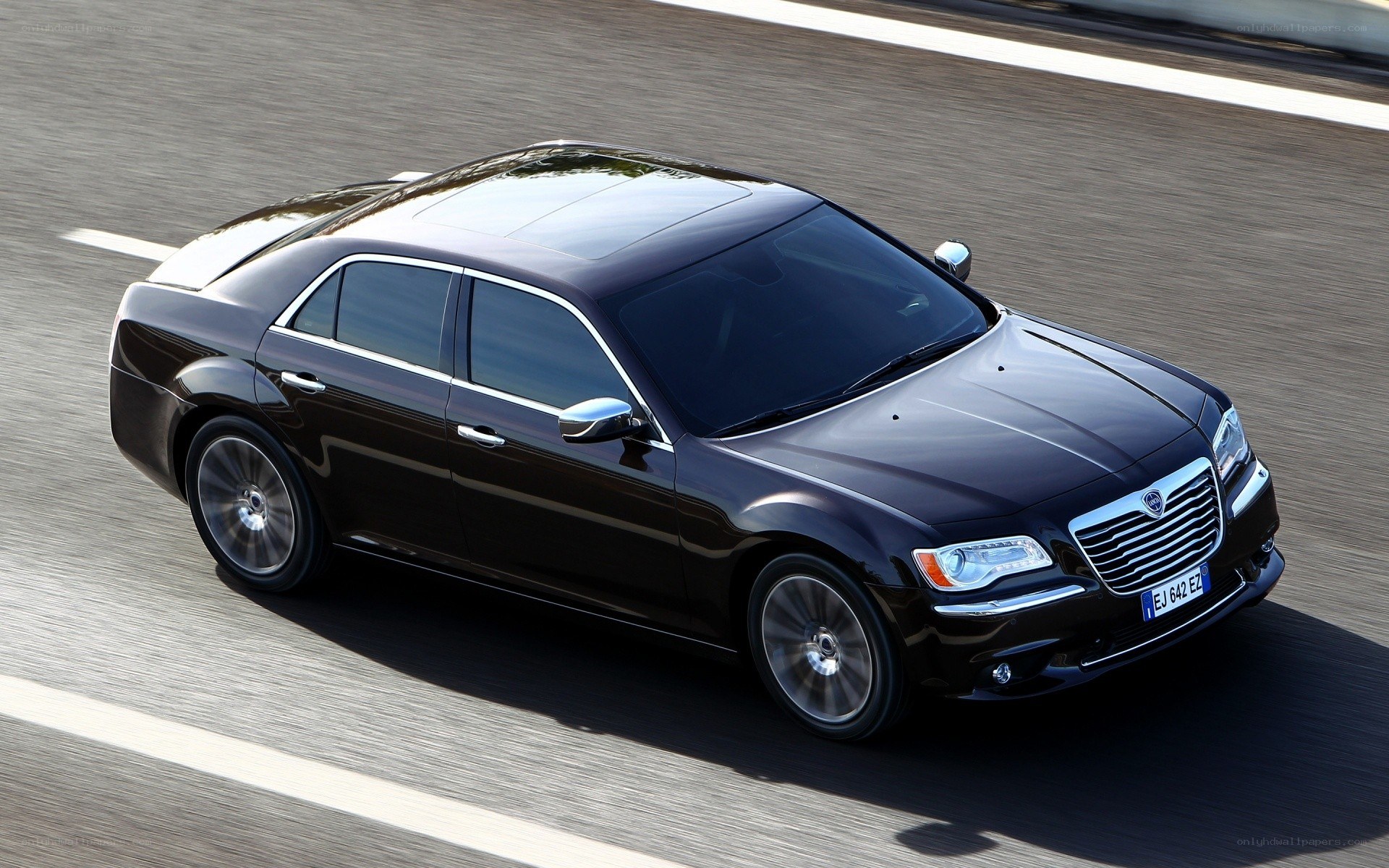 black chrysler 300 in motion