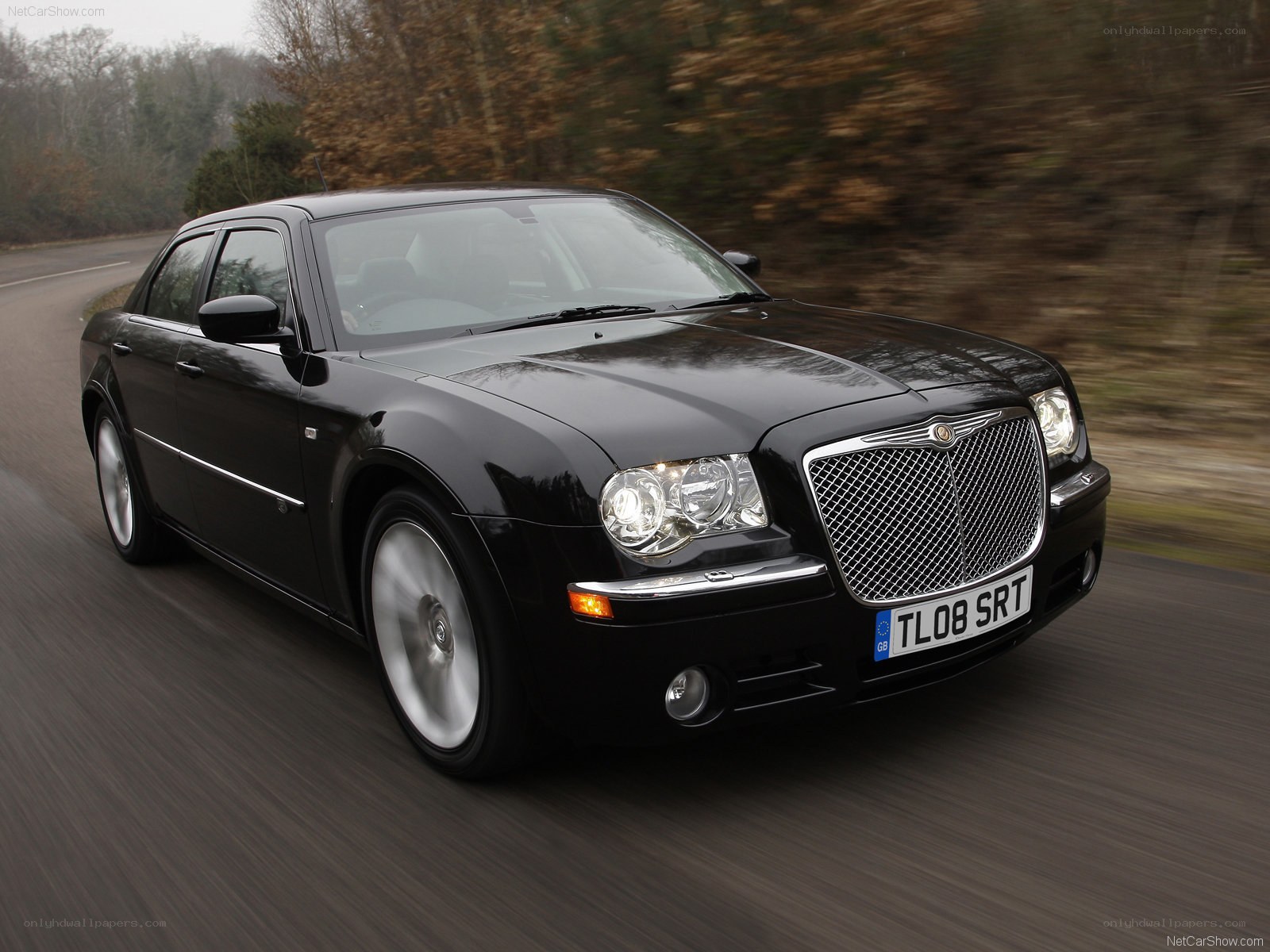 black chrysler 300 in motion