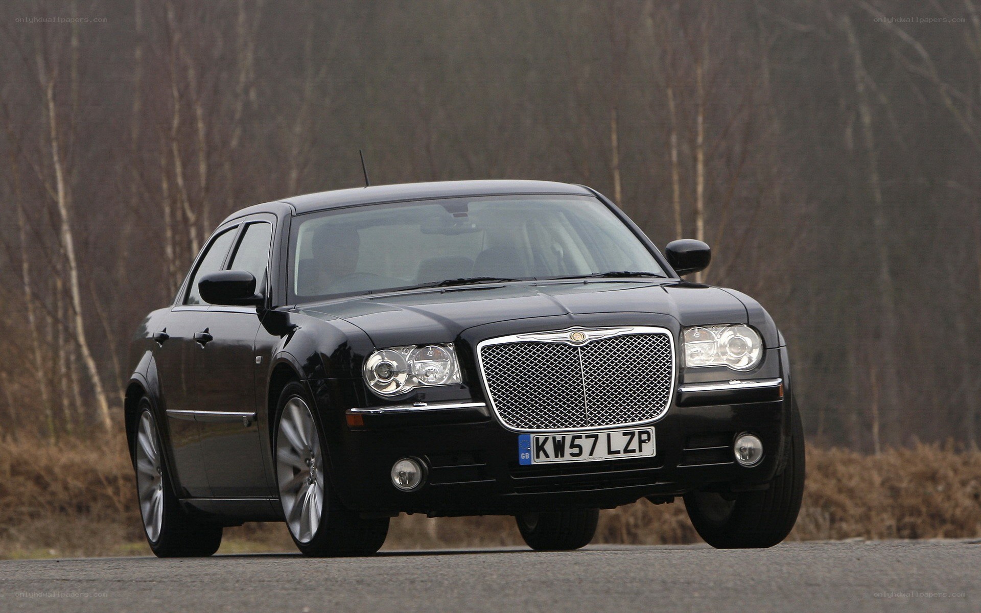 Black Chrysler 300 on a road