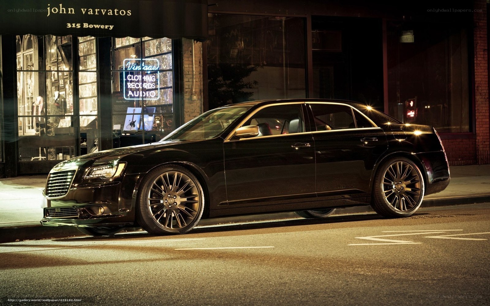 Black Chrysler on city street