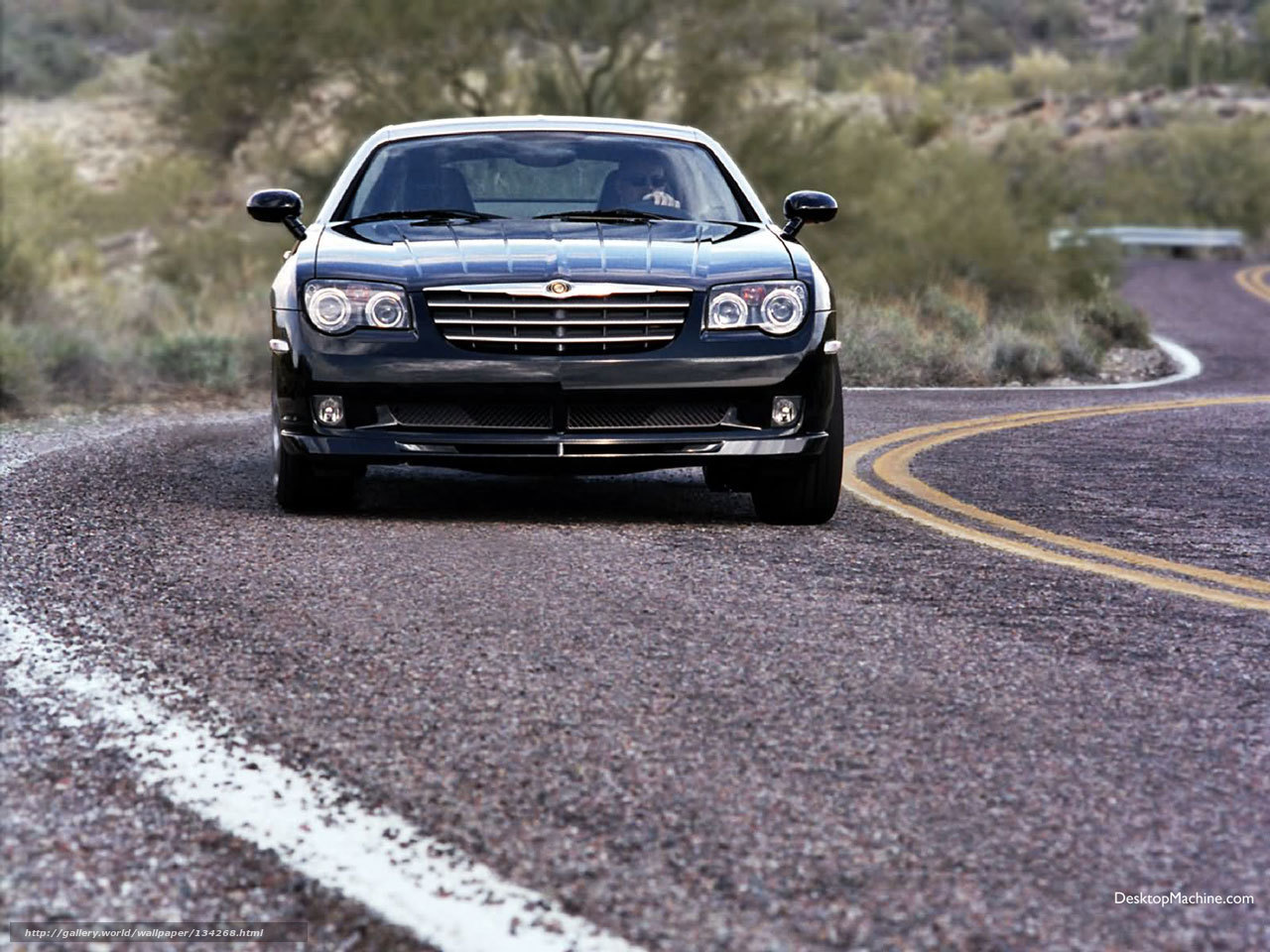 black chrysler on desert road