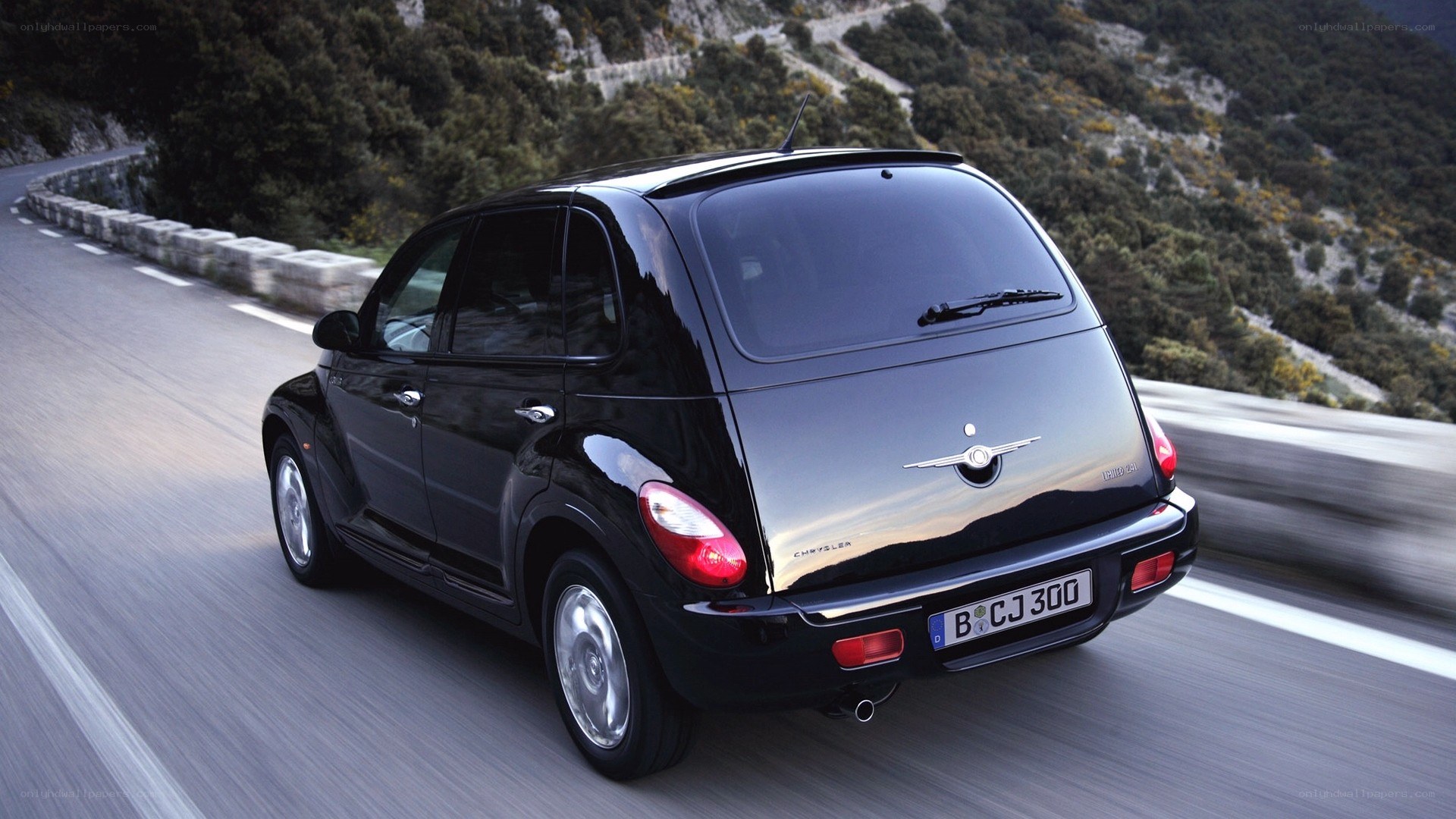 black chrysler pt cruiser driving