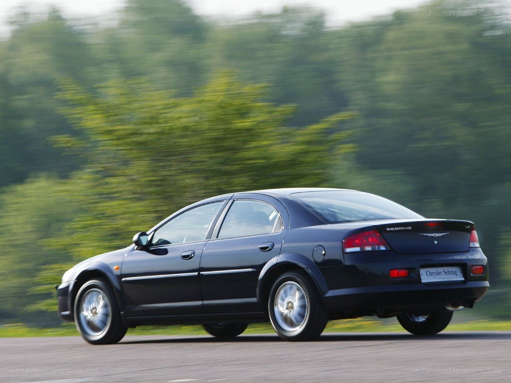 black chrysler sebring in motion