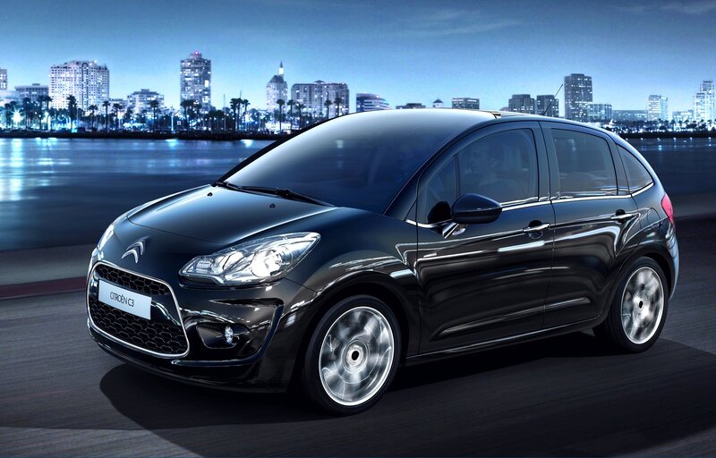 Black Citroën C3 on city road