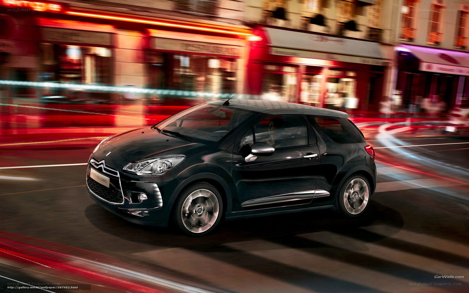 Black Citroen DS3 in city motion