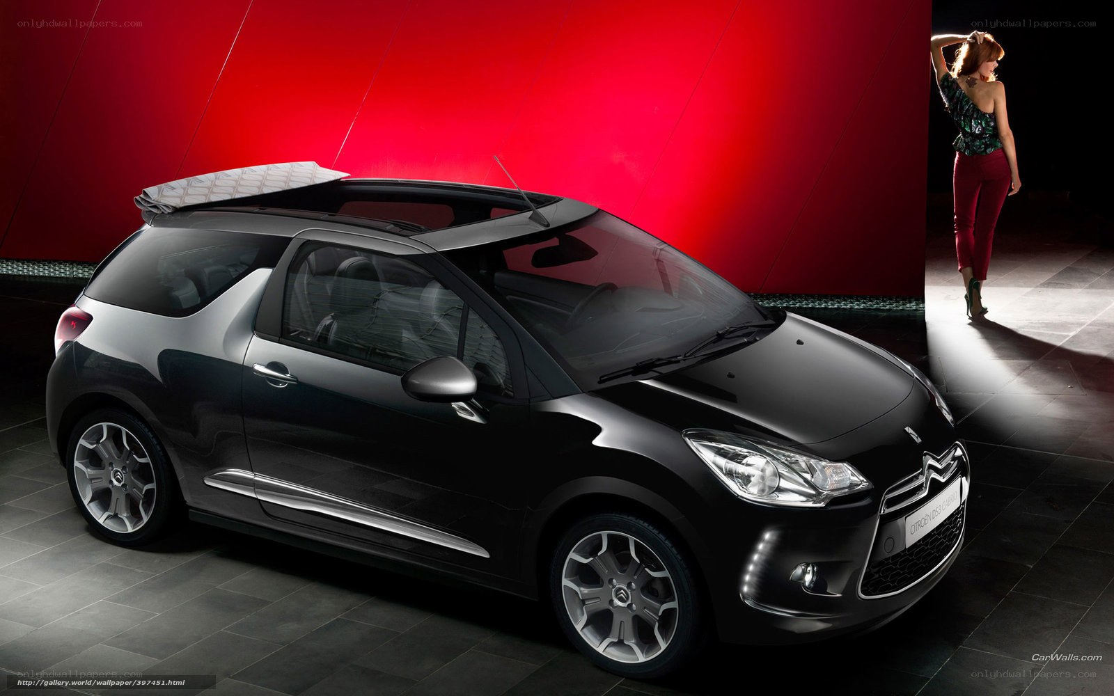 Black Citroen DS3 with woman