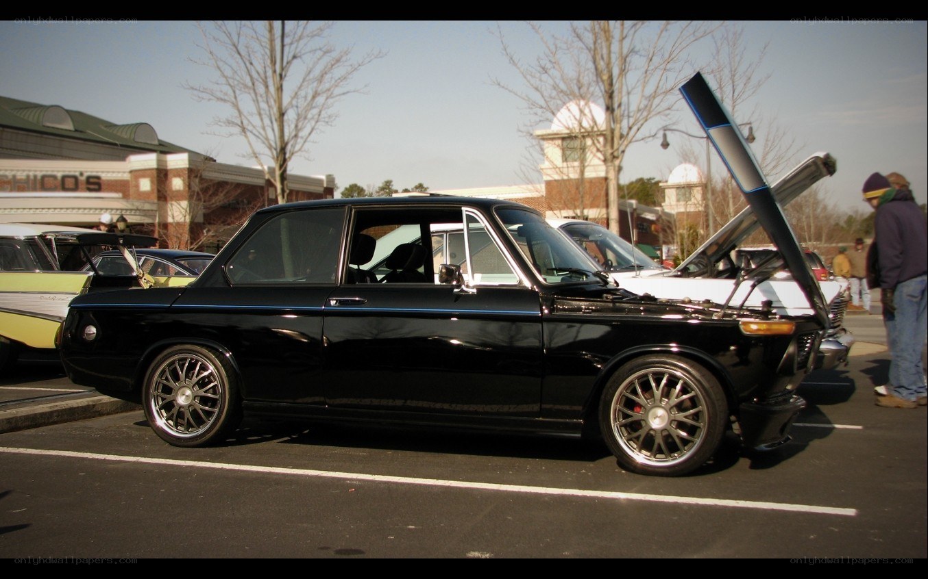 Black classic car at a show