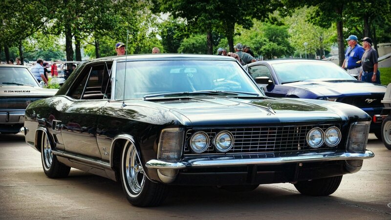 Black classic car at a show