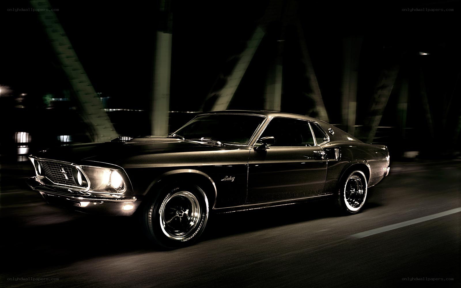 Black classic car at night
