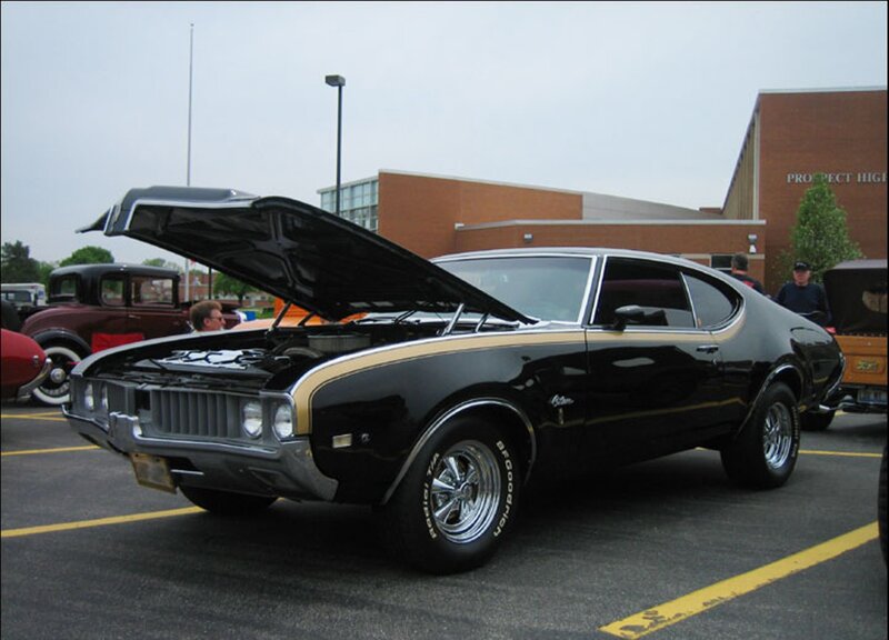 Black Classic Car — Calm, Afternoon, Photograph, Car Show, Building