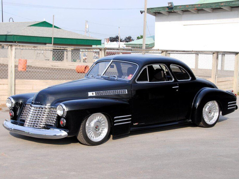 Black Classic Car — Calm, Afternoon, Photograph, Fence, Building