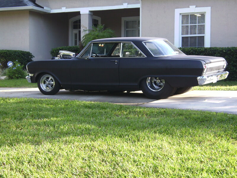 Black Classic Car — Calm, Afternoon, Photograph, House, Grass, Driveway