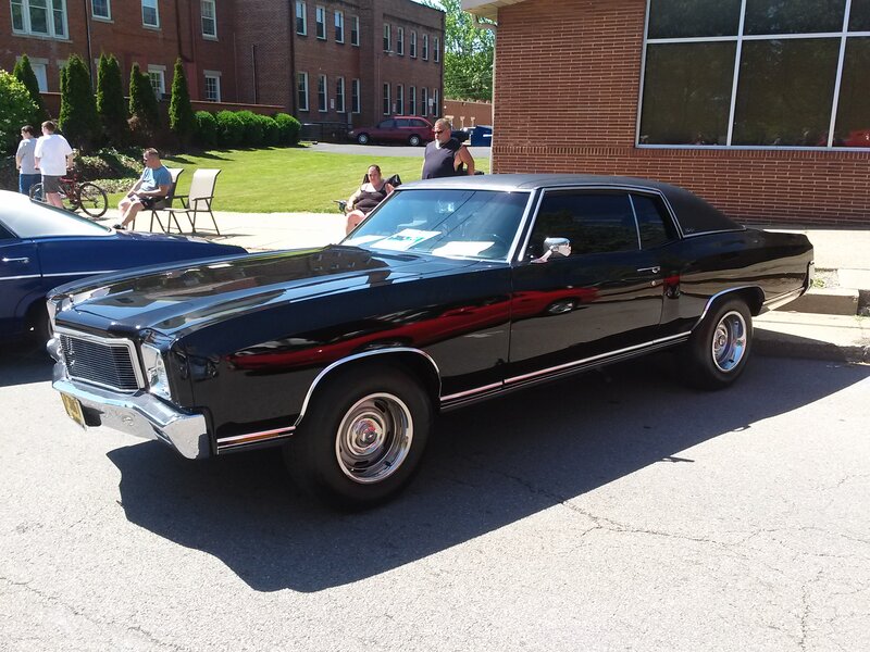 Black Classic Car — Calm, Afternoon, Photograph, People, Buildings