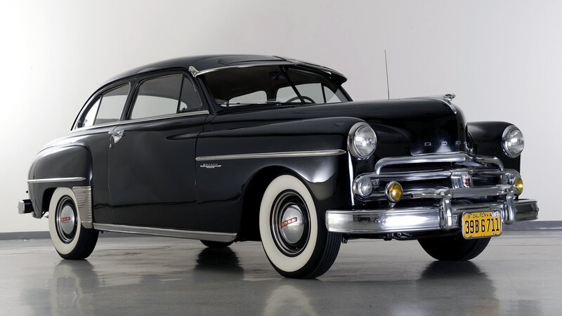 Black classic car display
