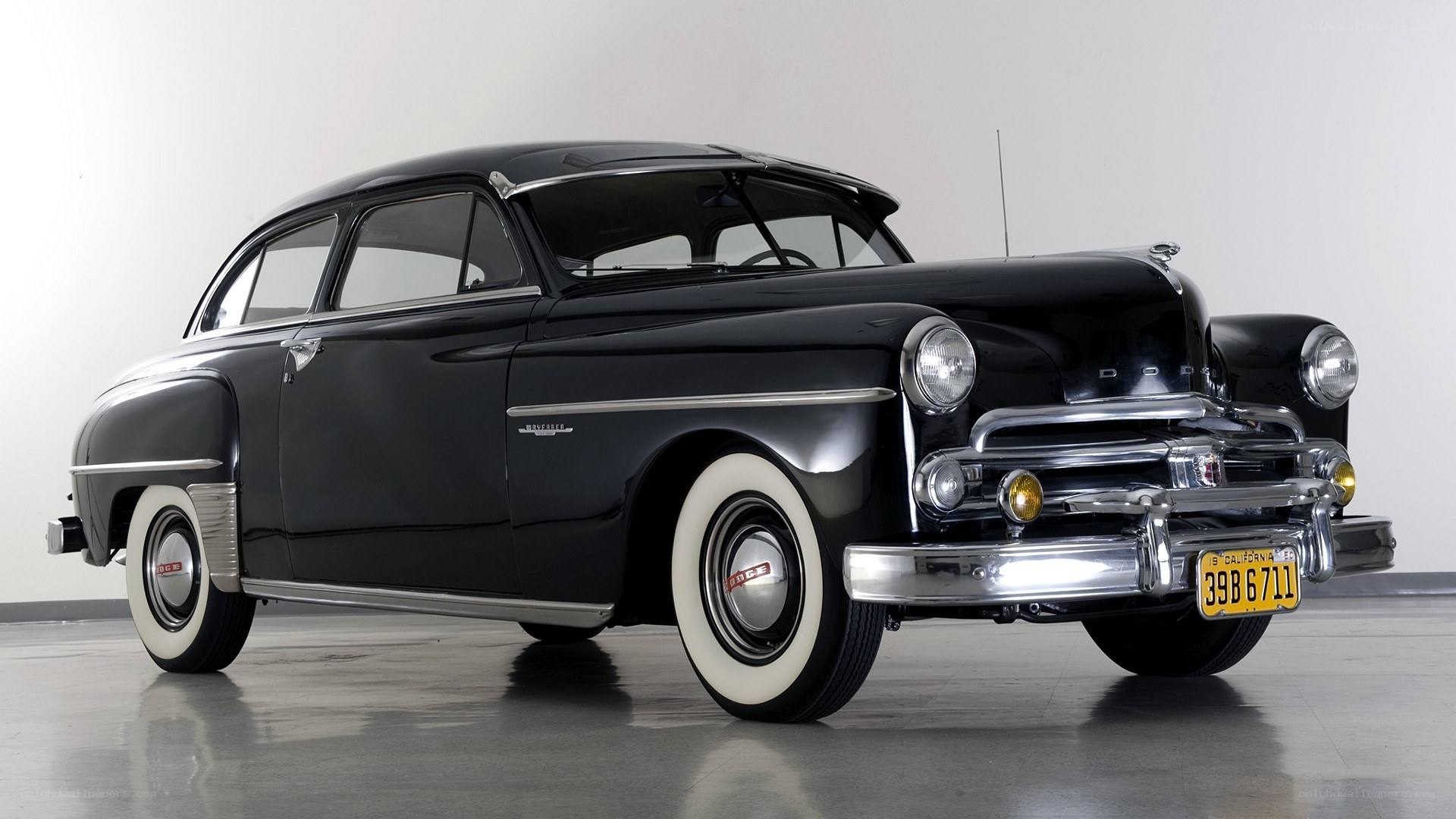 Black classic car display