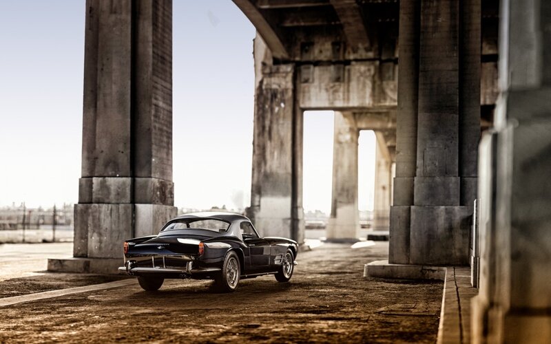 Black Classic Car — Dramatic, Afternoon, Photograph, Concrete Pillars