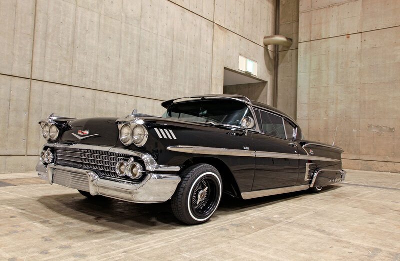Black Classic Car — Dramatic, Photograph, Concrete Wall