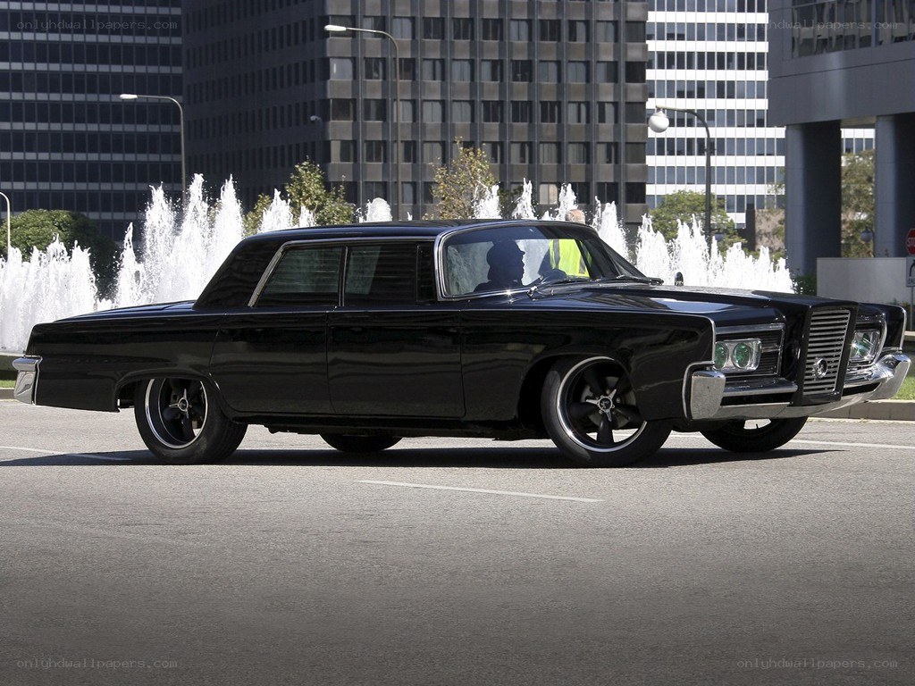 black classic car in city