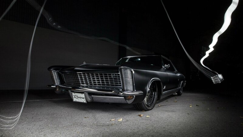 Black classic car in dark setting
