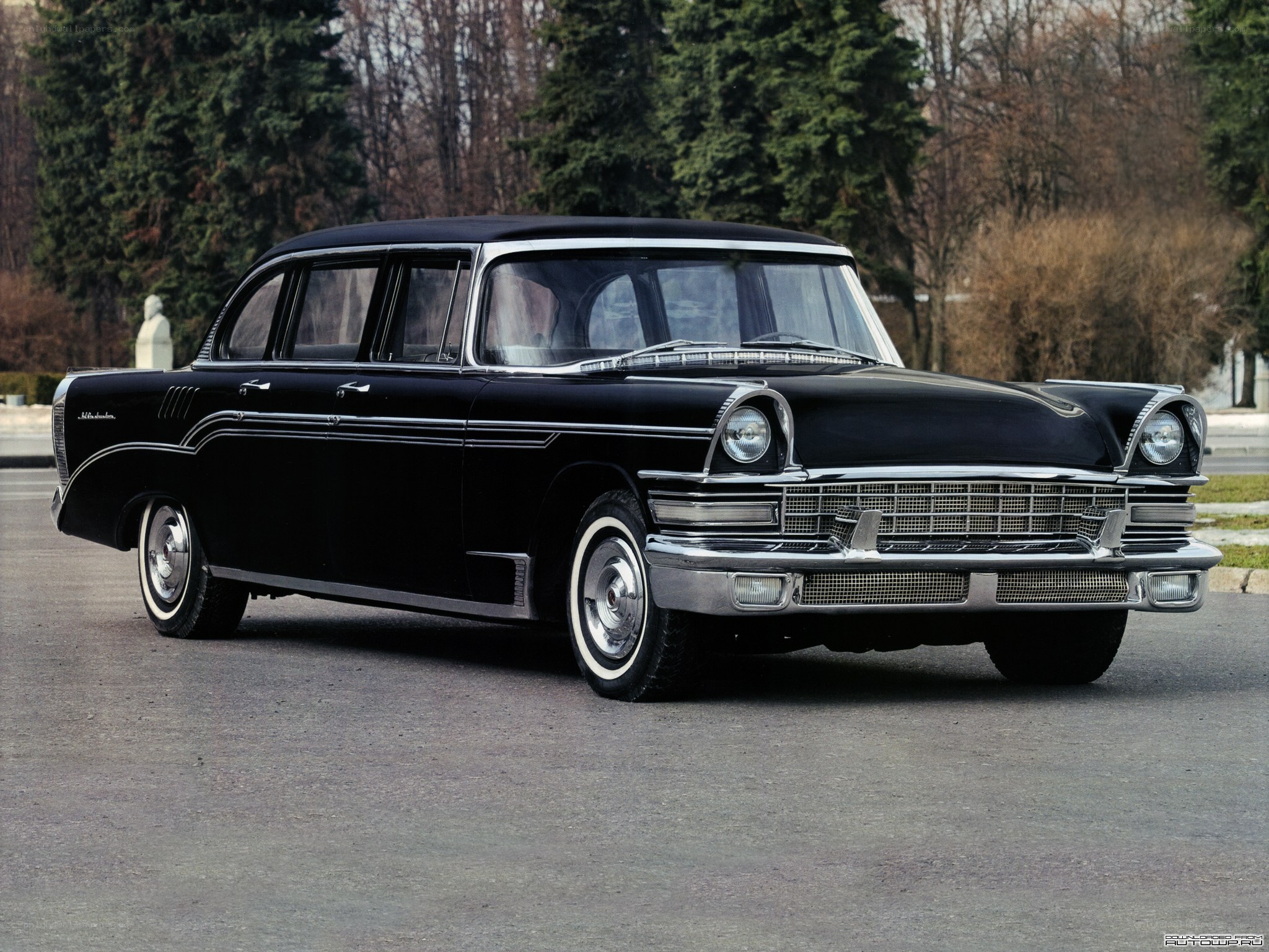 Black classic car in park