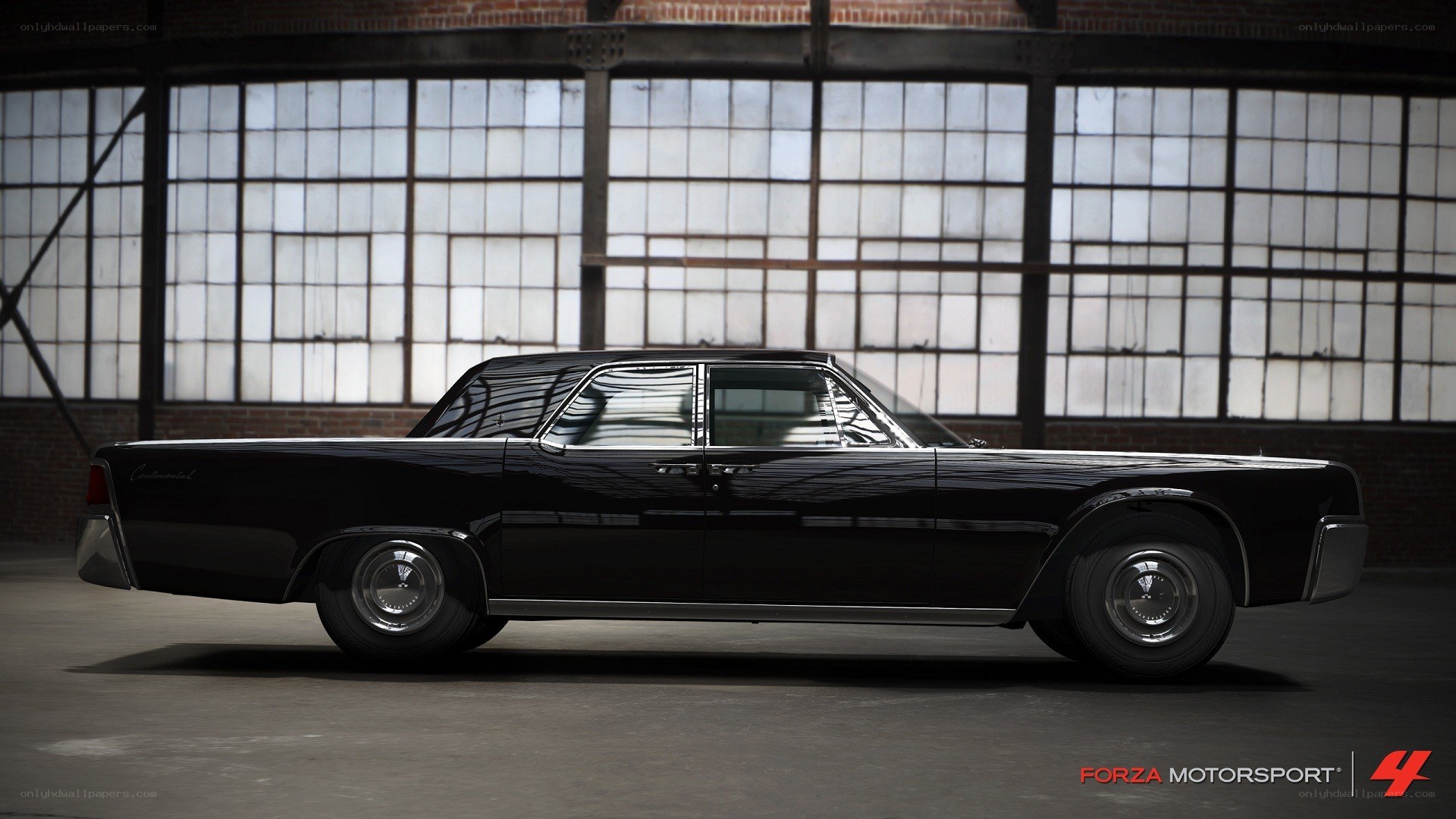 black classic car in warehouse