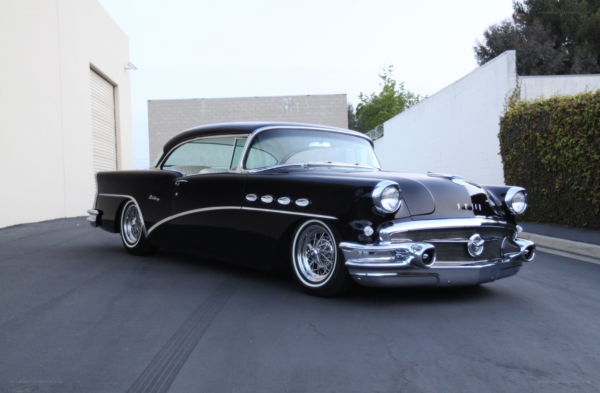 Black classic car on asphalt