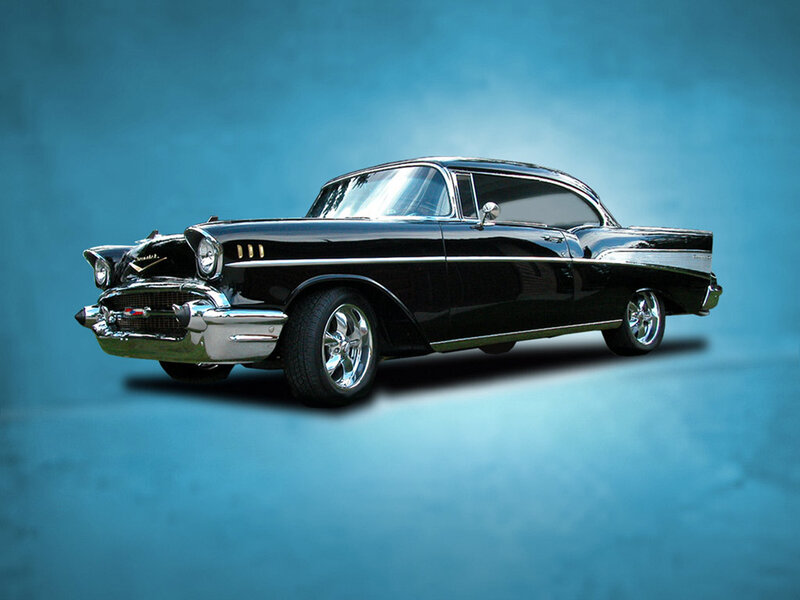 black classic car on blue