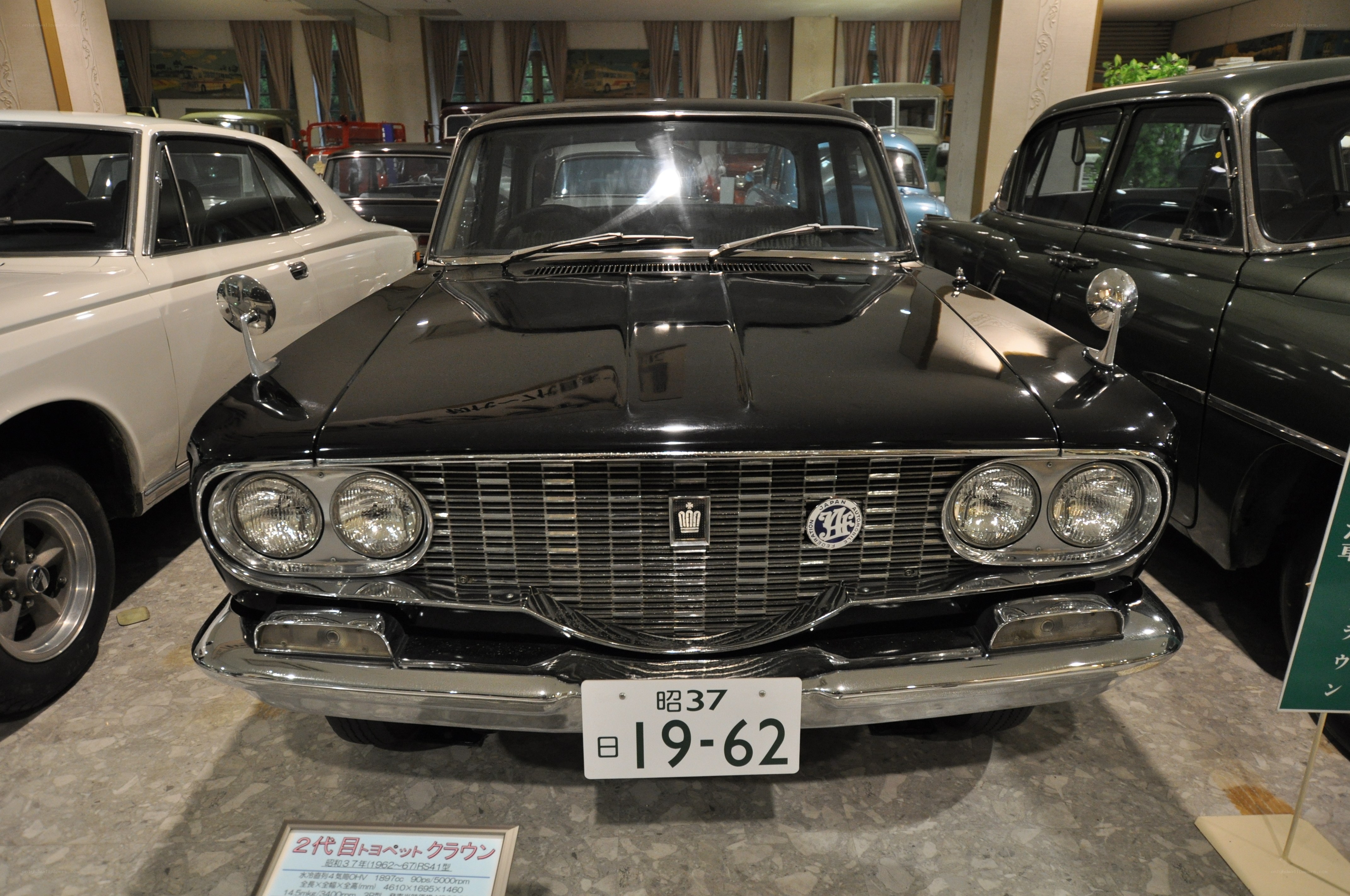 Black classic car on display