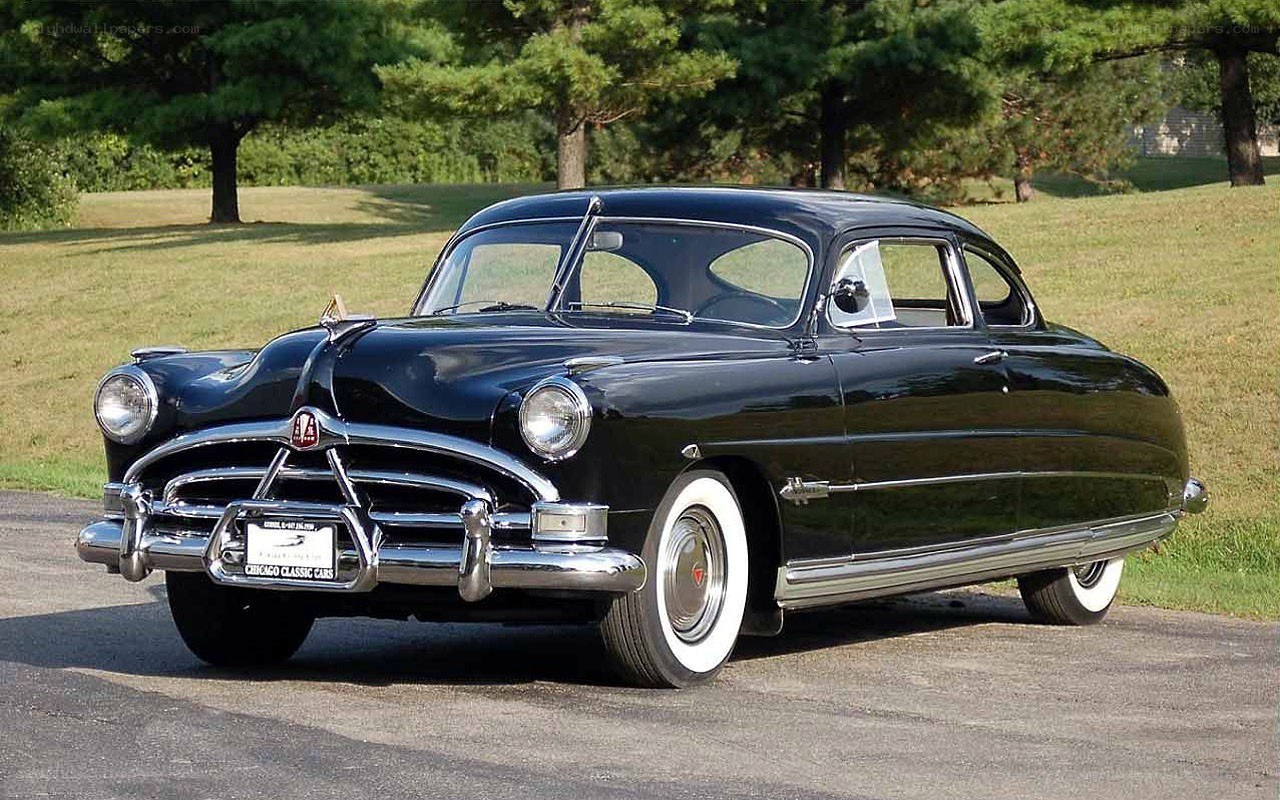Black classic car on display