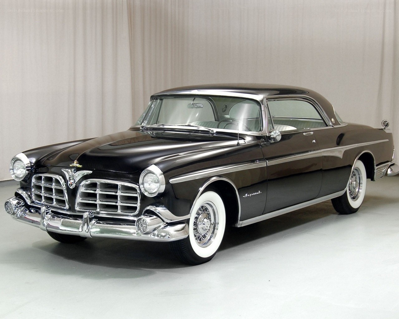 Black classic car on display