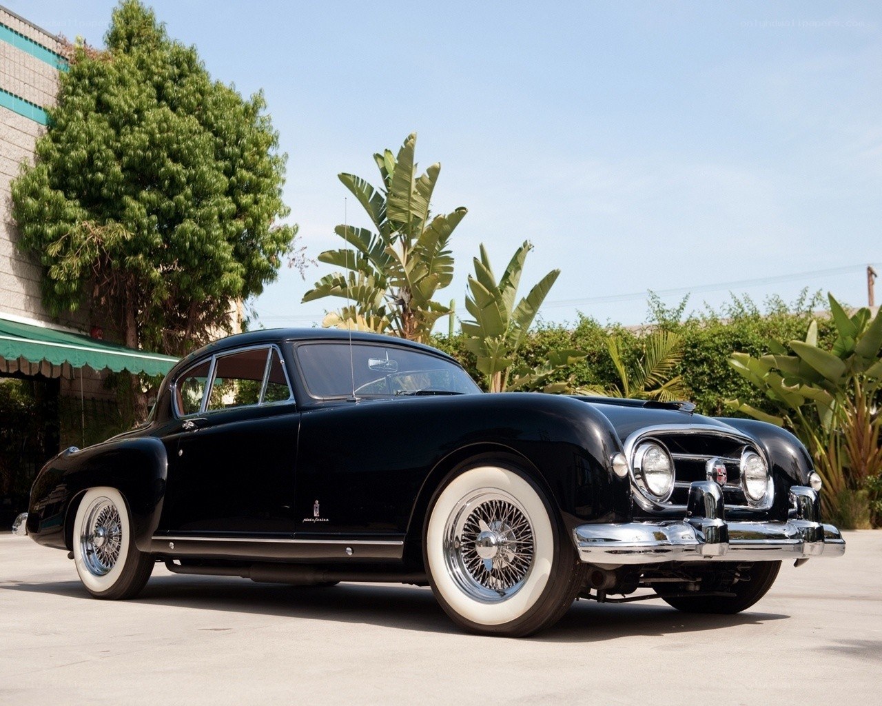 Black classic car on display