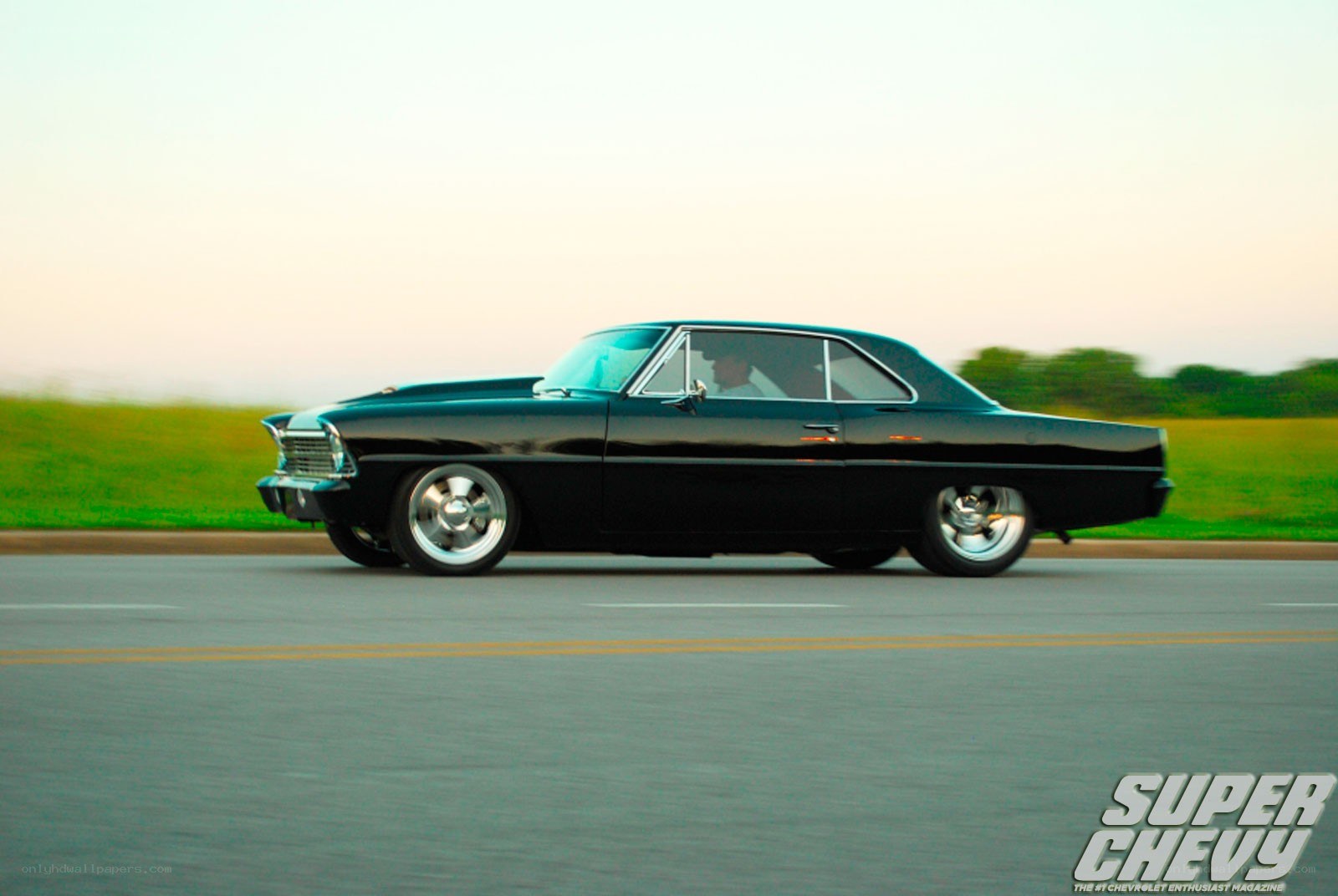 black classic car on road