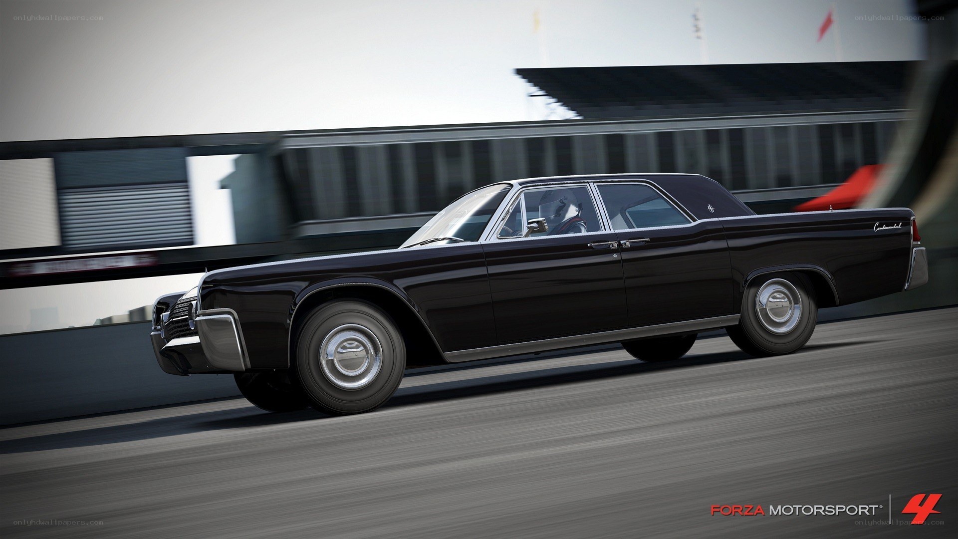 black classic car on track