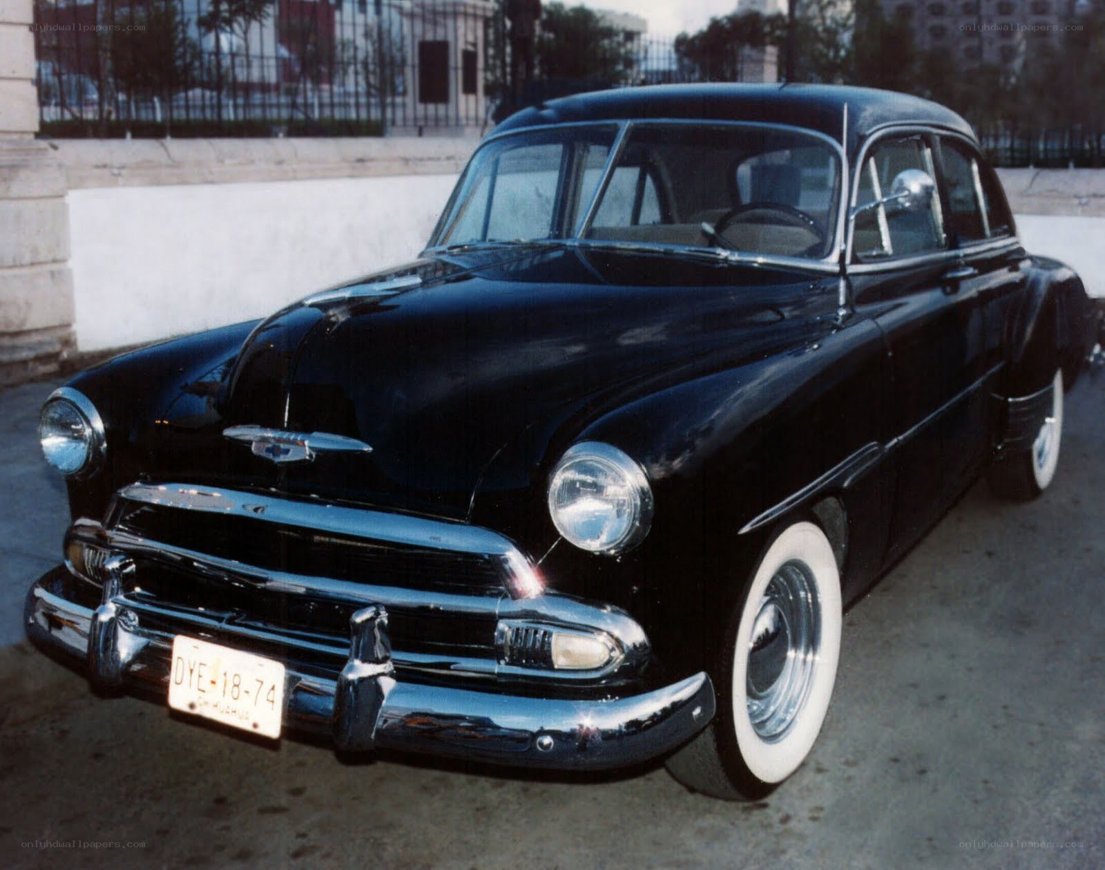 Black classic car parked outside